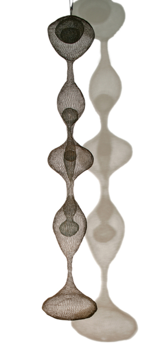 Ruth Asawa (American/Japanese, 1926-2013) 'Hanging Five-Lobed Continuous Form with Spheres Inside Four of the Lobes, Two of the Inside Spheres Containing Spheres within Them,' c. 1954. Keno Auctions image.