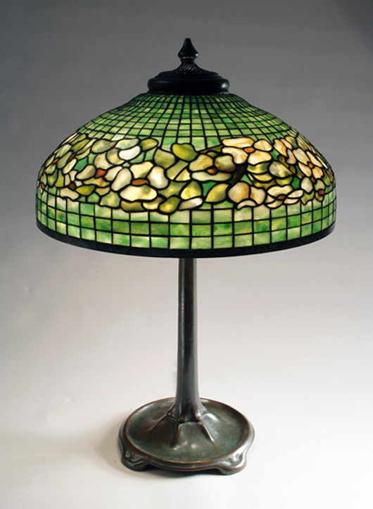 Tiffany Studios (1902-1932) ‘Dogwood border’ table lamp, c. 1910. Keno Auctions image.
