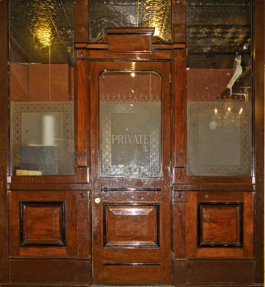 Edwardian office front, mahogany with original etched glass, est. $1,500-$2,000. Mosby & Co. image