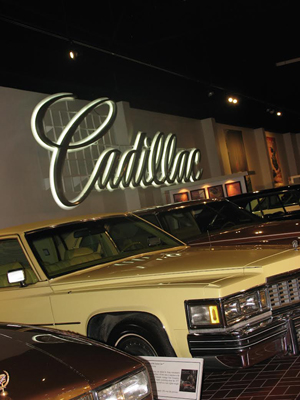 An interior view of the new museum showing a 26-foot-long long Cadillac sign. Image by Paul Ayres, courtesy of the Gilmore Car Museum.