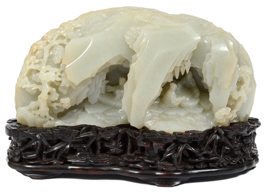 Chinese white jade boulder with figures in a grotto, 4 1/8 x 8¾in. Image: Auction Gallery of the Palm Beaches