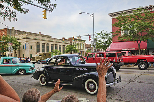 Classic cars cruising on Main Street during Goshen's First Friday event in July 2011. Image by Bbeachy2001. This work is licensed under the Creative Commons Attribution 3.0 License.