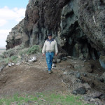 Bill Cannon, an archaeologist with the Bureau of Land Management, at Paisley Caves above the Summer lake plain in Lake County, Oregon. Image courtesy of Wikimedia Commons.