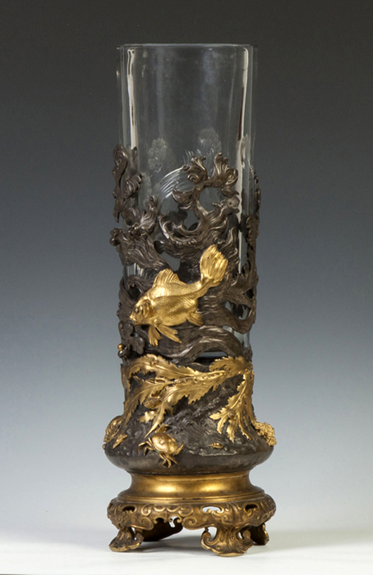 This beautifully crafted bronze and metal Asian vase with cut glass liner achieved $55,200. Cottone Auctions image.