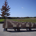 Benches facing the main memorial and crash site. Image by Found5dollar. This file is licensed under the Creative Commons Attribution-Share Alike 3.0 Unported license.