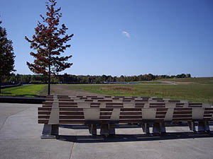 Benches facing the main memorial and crash site. Image by Found5dollar. This file is licensed under the Creative Commons Attribution-Share Alike 3.0 Unported license.