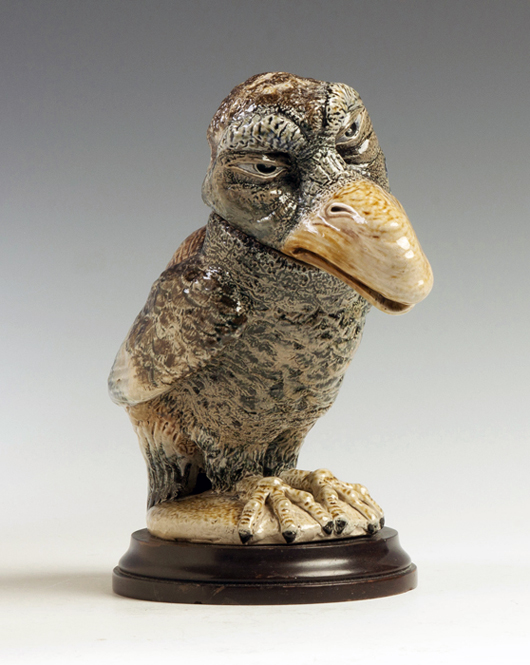 This impressive glazed stoneware bird tobacco jar, crafted by the Martin Brothers, brought $61,000. Cottone Auctions image.
