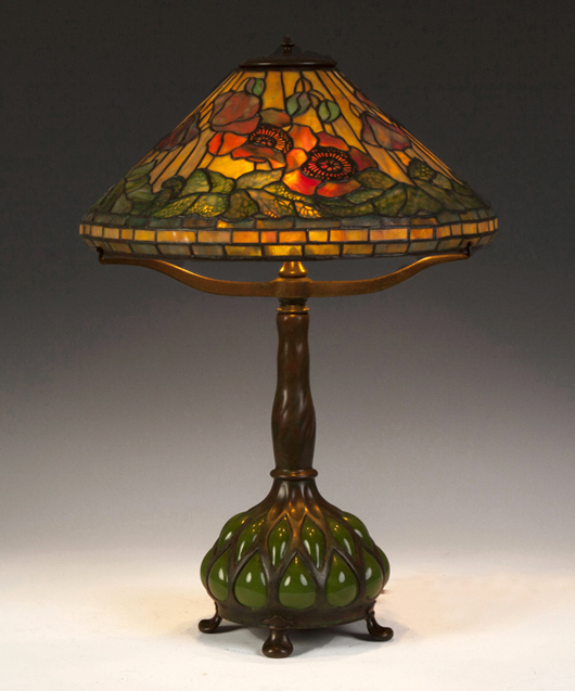 Tiffany Studios Poppy lamp, 24 inches tall, with an overlay filigree shade 17 inches in diameter. Price realized: $69,000. Cottone Auctions image.