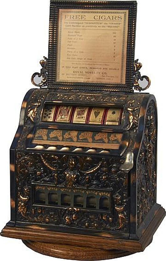 Royal Novelty co. ‘The Trader’ 5-reel poker machine/trade stimulator, circa 1902, pays off in cigars, $33,000. Morphy Auctions image