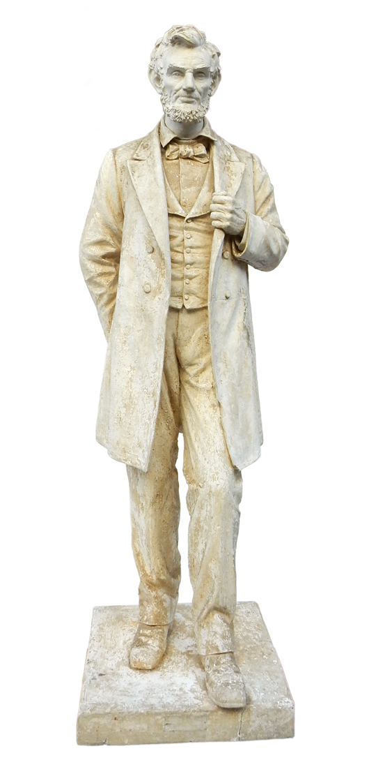 Cast composition statue of 'Standing Lincoln' after Augustus Saint-Gaudens’s bronze unveiled in 1881 at Chicago’s Lincoln Park. This sculpture stands nearly 7 1/2 feet high. Roland Auctions image.