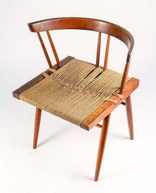 Modern grass seat armchair, made in the 1960s by George Nakashima (Japanese/American, 1905-1990), with a walnut wood frame. Price realized: $2,250. Ahlers & Ogletree image