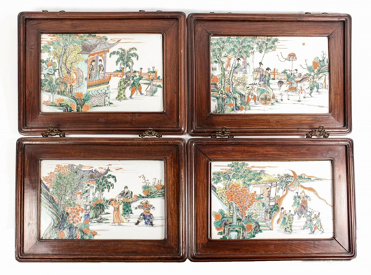 Set of four Chinese Kangxi style porcelain enameled tiles in the famille verte palette, each one housed in a rosewood frame. Price realized: $4,500. Ahlers & Ogletree image