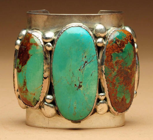 Sterling silver bracelet with five large turquoise stones, marked ‘ENCBIERRS,’ est. $250-$350. Morphy Auctions image