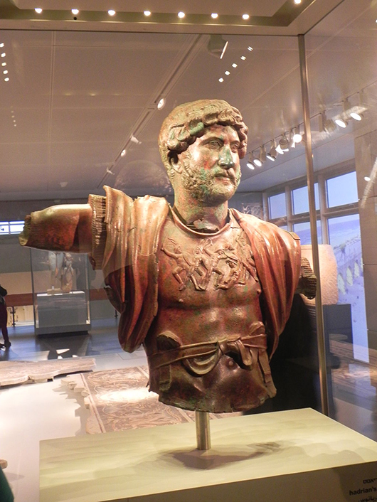 Bronze statue of Hadrian unearthed at Tel Shalem, which was once a camp of the Sixth Roman Legion. Displayed at the Israel Museum, the statue commemorates the Roman military victory over Bar Kochba. Image courtesy of Wikimedia Commons.