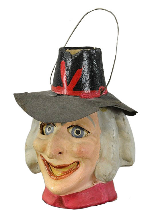 This 5-inch-tall witch-head jack-o'-lantern made in Germany is probably from the 1920s. Although the paint has been touched up, it sold for $1,121 at a 2014 Bertoia auction in Vineland, N.J.