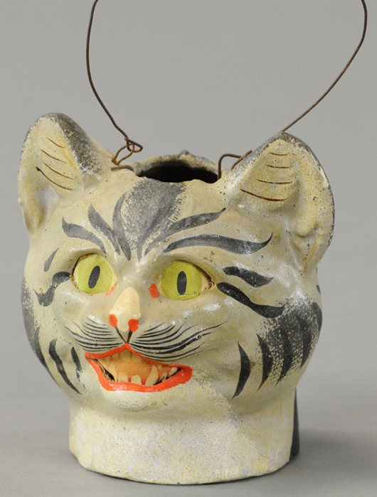 Vintage composition tabby cat lantern with paper inserts for eyes and mouth, 4in tall (not counting handle), comes with lift-out candleholder. Sold at Bertoia’s for $2,074 on March 29, 2014. Image courtesy LiveAuctioneers Archive and Bertoia Auctions