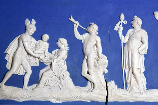 A blue and white Jasper plaque modeled by William Hackwood showing Hermes delivering the infant Bacchus to one of the Nymphs of Nysa. It dates from 1775-80. Photo The Wedgwood Museum/Phil Sayer