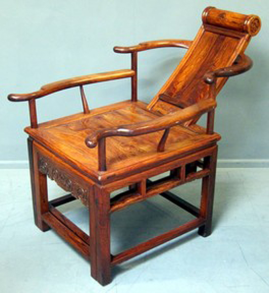 This carved huanghuali armchair with reclining back sold for £9,000. Photo Ewbank’s auctioneers