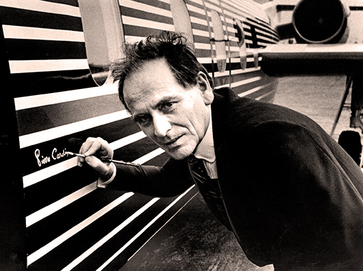 Pierre Cardin signing his new executive jet design in 1978. Image courtesy of Wikimedia Commons. 