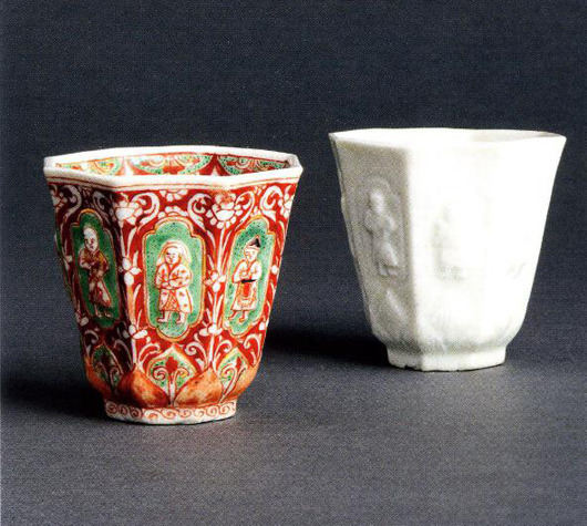 Two late 17th or early 18th century blanc de Chine beakers molded with images of the Eight Immortals. That on the left was decorated in England in green and red with black highlights. Saleroom estimate together: £500-800, sold for £1,000 ($1,587). Photo: Woolley & Wallis