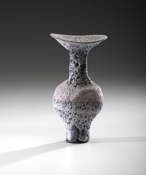 Lucie Rie (1902-1995; Austria/UK), ‘Flared Rim Bottle,’ circa 1986, stoneware; soft pink and gray crater glaze, 9 1/2 inches high. Sold for $12,300, inclusive of buyer’s premium, to a bidder through LiveAuctioneers. Cowan’s Auctions Inc. image