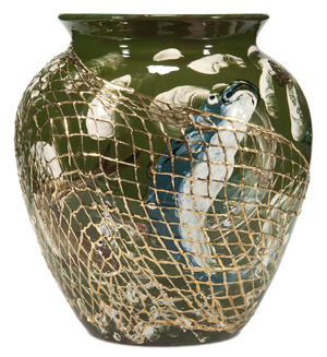Look at the bottom of a vase to identify it. This vase has marks indicating it is a piece of Rookwood pottery made in 1883 by a talented decorator. It auctioned for $5,290 at Humler & Nolan of Cincinnati. Unmarked it would have sold for much less.
