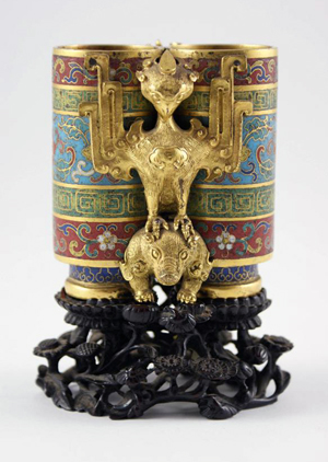 A rare 18th century gilt bronze and cloisonné vase with the Imperial Qianlong (1736-95) mark on the foot of each vessel indicating it was made by the most skilled craftsmen, possibly in the palace workshops of the Forbidden City itself. It sold for £228,000. Photo: Byrne’s auctioneers