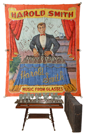 1940 Fred Johnson banner of Howard Smith, plus an original Victorian water harp, or water harmonica. Mosby & Co image