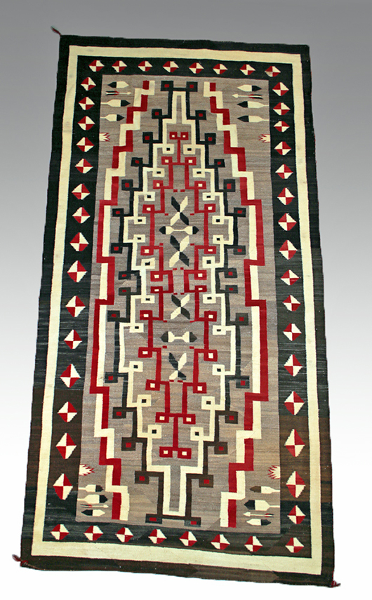 Navajo rug with eagle feather design, Crystal Area, Arizona/New Mexico, circa mid-10th century CE. Est. $5,500-$7,500. Artemis Gallery image