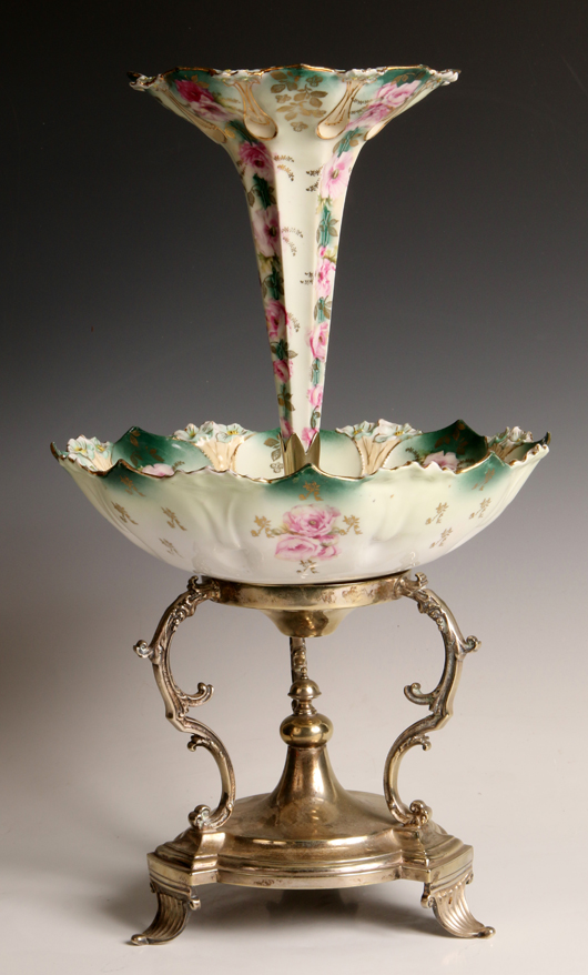 Unmarked RS Prussia porcelain epergne rounded bowl with a single matching lily trumpet, 17½  inches high overall. Estimate: $5,000-$10,000. Dirk Soulis Auctions image