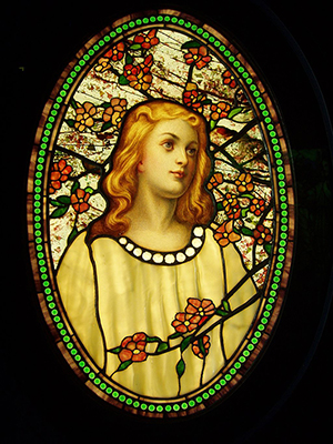 'Girl with Cherry Blossoms,' Tiffany Glass & Decorating Co., circa 1890. Image courtesy of Wikimedia Commons
