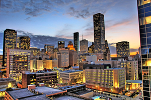 Night view of the northern end of downtown Houston, a booming metropolis with a vibrant art scene. Wikimedia Commons image licensed under the Creative Commons Attribution 2.0 Generic license.