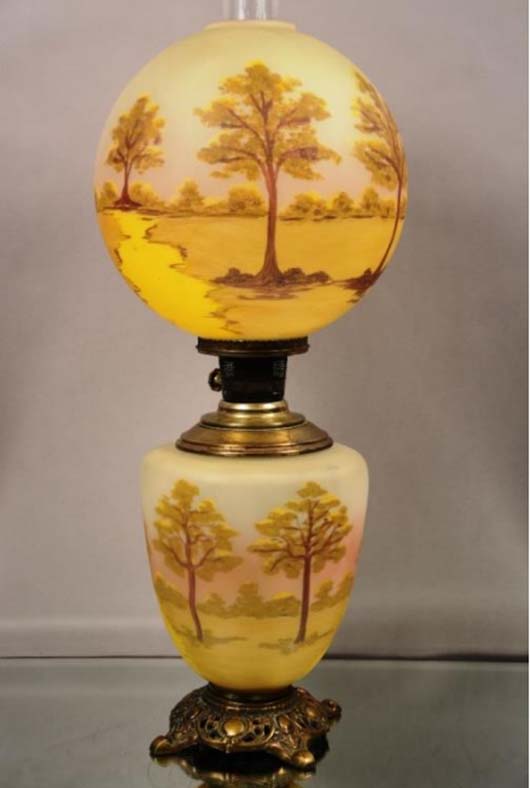Rare scenic 'Gone with the Wind' reverse-painted parlor lamp, matching shade and base, circa 1800, 28in high, est. $850-$1,400. Bruhns image