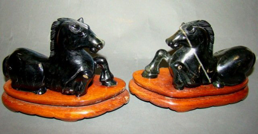 Pair Chinese carved black jade horses on stands, 4.25in x 6.5in. Estimate: $1,000-$1,500. Tonya A. Cameron Auctions image