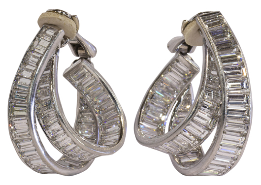 The reigning highlight of the jewelry offerings was this pair of diamond and platinum hoop earrings, G. Arzilli, Italy, set with rectangular step cut diamonds totaling approximately 36.50 carats. The pair sold for $44,600. Clars Auction Gallery image
