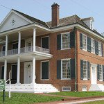 During William Henry Harrison 's governorship of the Indiana Territory, Grouseland was the focal point of the social and official life of the territory. The Federal-style home was built for Harrison in 1804. Image by Nyttend, courtesy of Wikimedia Commons.
