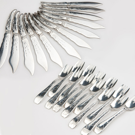 One of 25 lots of Tiffany & Co.’s Lap Over Edge flatware, this set of fish forks and knives for 12 brought $7,200, equaling $300 per piece in the set. John Moran Auctioneers image