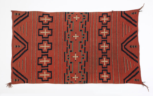 Handwoven from raveled American flannel and indigo-dyed green wool, this circa 1870-1880 late Classic Period Navajo child’s wearing blanket found a buyer for $19,200 at John Moran’s November Auction. Estimate: $5,000 to $7,500. John Moran Auctioneers image