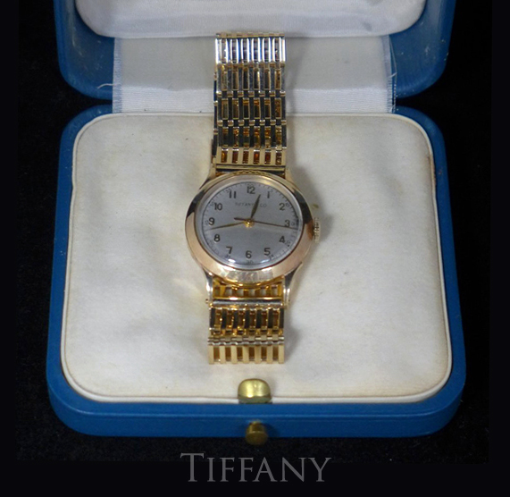 Tiffany & Co. man’s 14K gold wristwatch with original case. Approx. total weight 537 grams. Est. $2,000-$2,500. Sterling Associates image