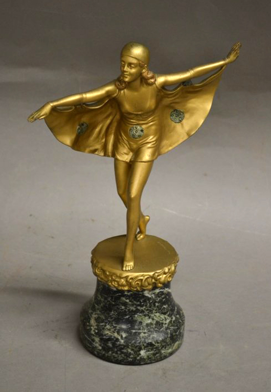 Otto Poertzel (German 1876-1963), dore bronze figure known as ‘Bat Dancer’ or ‘Butterfly Dancer,’ circa 1930, signed on base, 14in high, est. $2,000-$3,000. Sterling Associates image