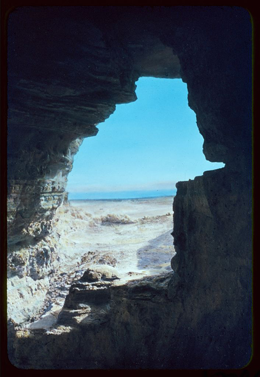 A view of the Dead Sea from a cave at Qumran in which some of the Dead Sea Scrolls were discovered. Image by Eric Matson, Matson Photo Service, courtesy of Wikimedia Commons.