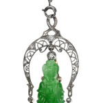 Imperial apple green carved jade, pearl, diamond and platinum Buddha pendant necklace, c1925, POA from T. Robert. The Mayfair Antiques & Fine Art Fair image