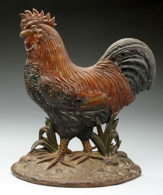 Spencer 11-1/8 inch double-sided cast-iron rooster doorstop with intricately detailed feathers and comb, est. $5,000-$7,000. Morphy Auctions image