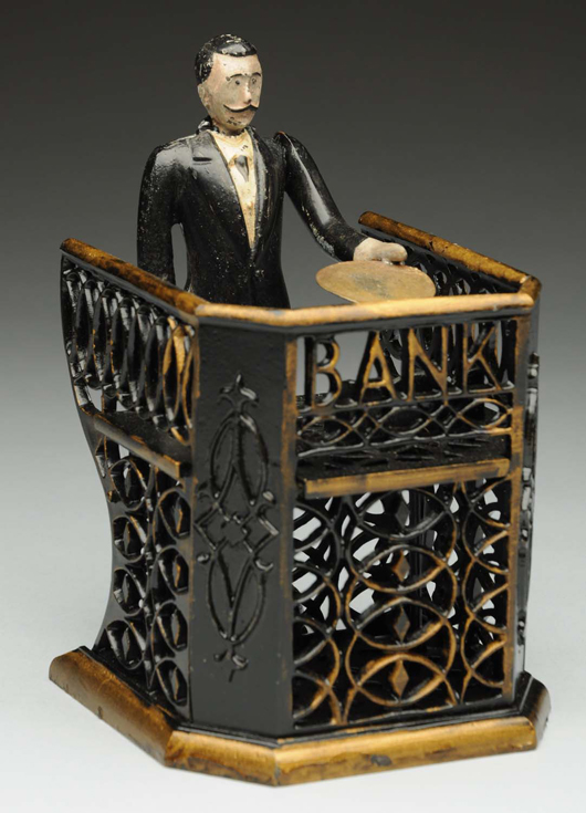 J. & E. Stevens Bank Teller cast-iron mechanical bank, est. $20,000-$30,000. Morphy Auctions image