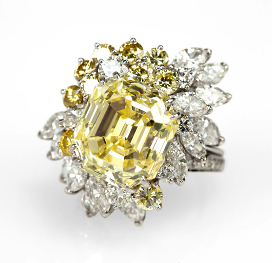 Selling for $228,000, within the $200,000 to $250,000 estimate, this platinum ring centering a 12.82 natural fancy yellow rectangular step-cut diamond was purchased by a floor bidder who had to compete with a number of hopeful absentee bidders. John Moran Auctioneers image