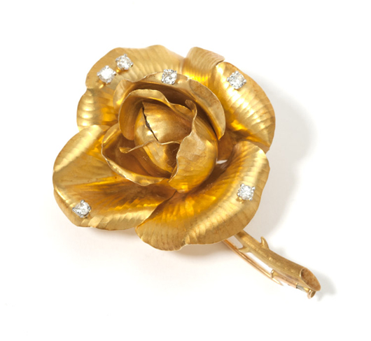 This hand-hammered rose brooch by iconic maker Tiffany & Co. was initially estimated to earn $1,200 to $1,800, but outgrew its estimate with a $5,700 selling price. John Moran Auctioneers image 