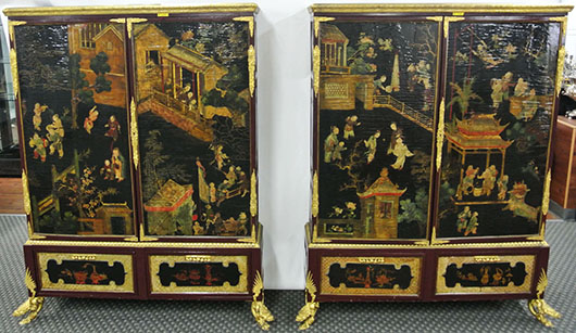 Pair of matching 19th-century Napoleon III ormolu mounted black-and-cream lacquered cabinets on winged dragon feet, each cabinet 5ft 6in tall by 4ft 2in wide, est. $100,000-$150,000. Don Presley Auction image