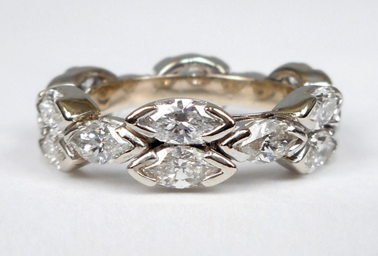 18K diamond eternity band. Est. $3,000-$4,000. Stephenson's Auctioneers image