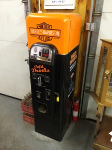Harley-Davidson-themed soft drink dispenser, with the distinctive black and orange H-D logo. Tim’s Inc. Auctions image
