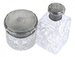 Two items from Hitler’s mistress Eva Braun’s dressing table: a crystal square decanter and matching powder jar ($2,135). Mohawk Arms Inc. image